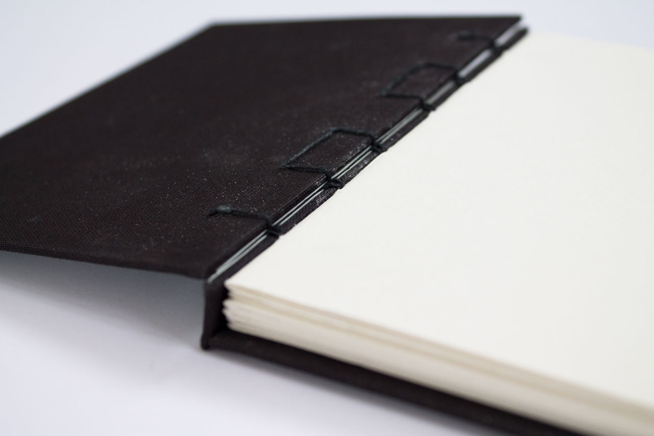 opened book with belgian binding